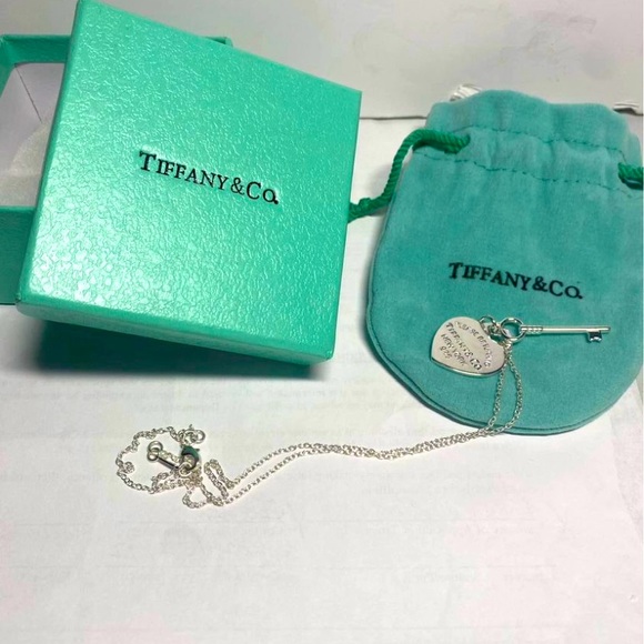 Brand new Tiffany Heart and key, has box and pouch. $350.00 - Picture 1 of 3